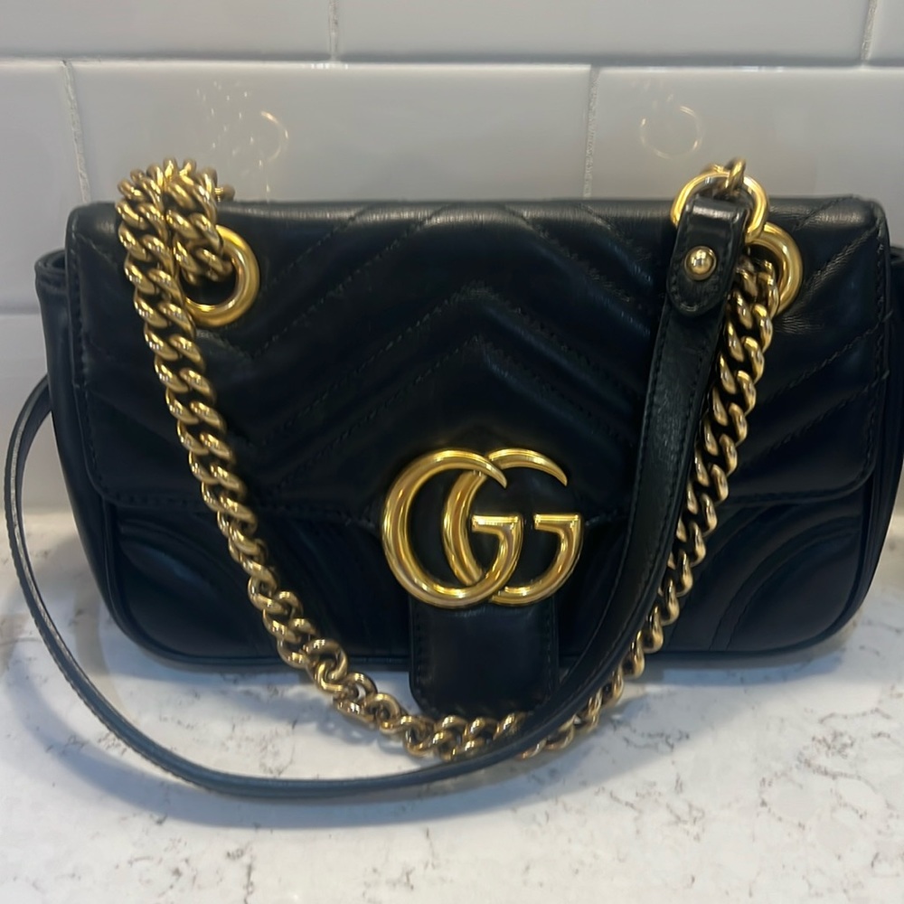 Very gently used Gucci Marmont black leather purse